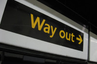 Photo of a "way out" sign by Redvers via Flickr