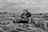 At the giant limestone pavement at Malham Cove in England