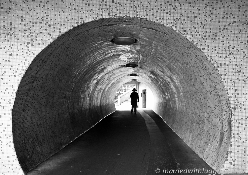 Introvert walking through a tunnel